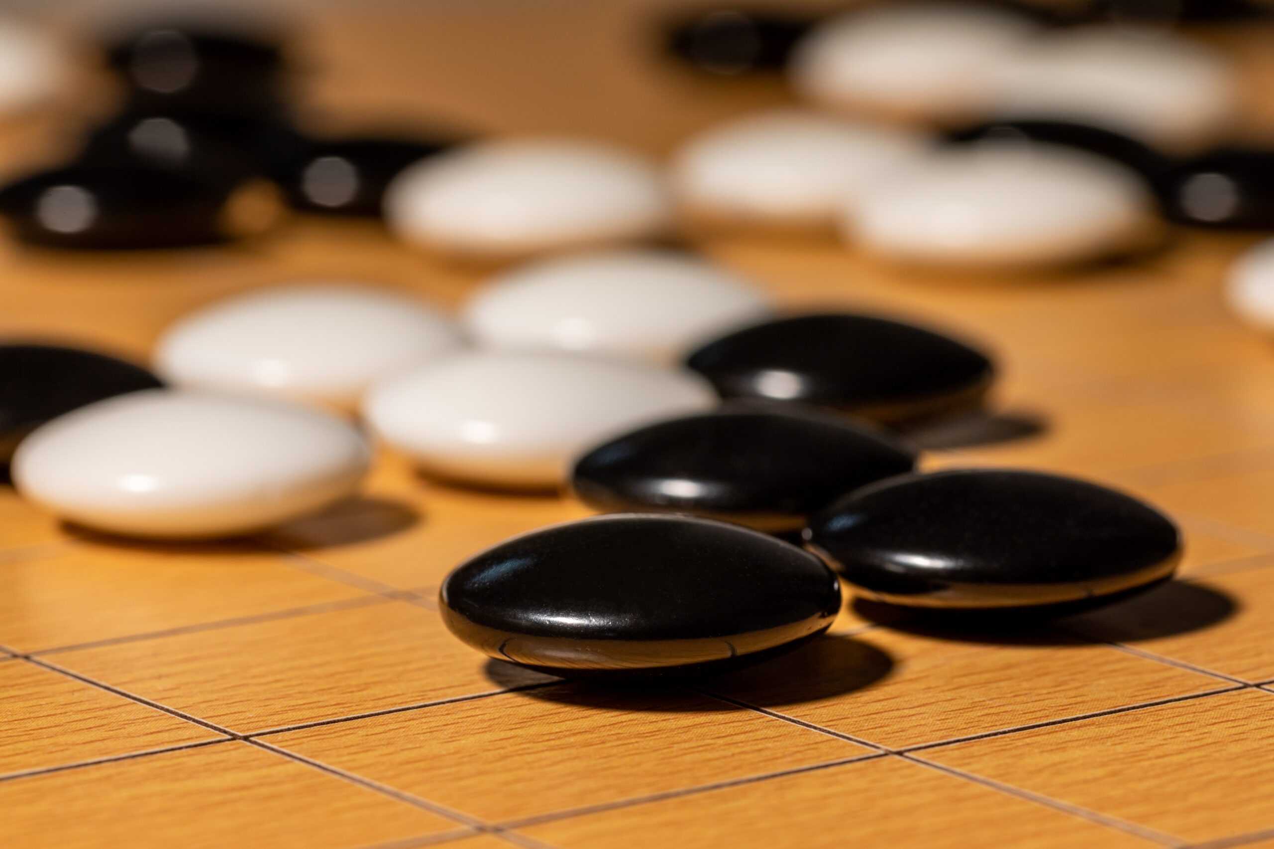 바둑판 위 결정적 한 수, 신의 한 수를 상징하는 장면